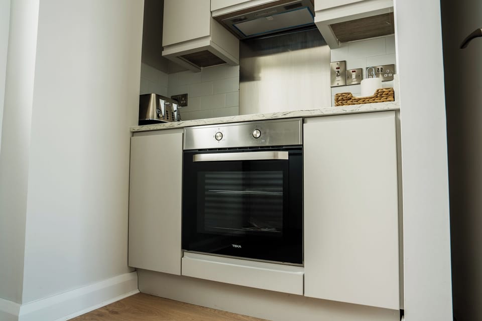Family Apartment, Balcony, Sea View | Private kitchen | Highchair