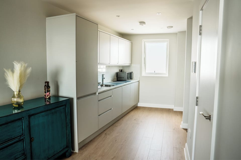 Family Apartment, Balcony, Sea View | Private kitchen | Highchair