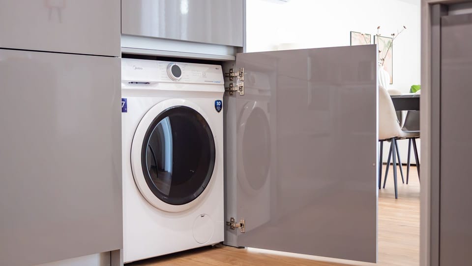 Enjoy the ultimate convenience of an in-unit washer and dryer, allowing you to refresh your clothes with ease during your stay. This sleek, integrated setup means you can pack lighter and always have fresh garments ready for your adventures. 
#LaundryConv