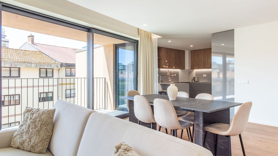 Experience seamless living in this open-plan space, where a modern kitchen and dining area flow into a comfortable lounge, all bathed in natural light. Step out onto your private balcony to savor the city views and fresh air, perfect for morning coffee or