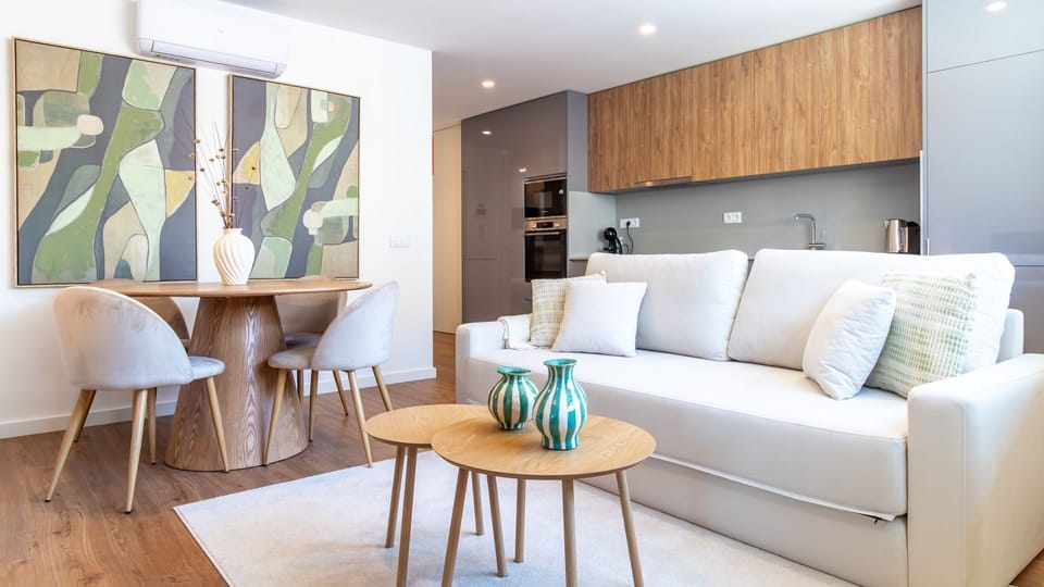 Unwind in the bright and airy open-plan living area, perfect for relaxing on the comfortable sofa or gathering around the stylish dining table for meals. This versatile space seamlessly connects living and dining, ideal for both entertaining and quiet eve