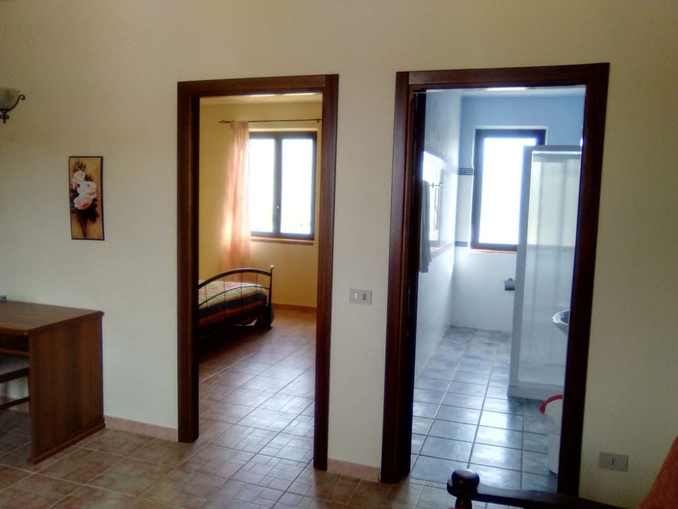 Triple Room | Living area | Flat-screen TV