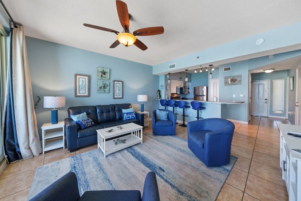 Living Room with Private Balcony Access, Sleeper Sofa and Flat Screen TV