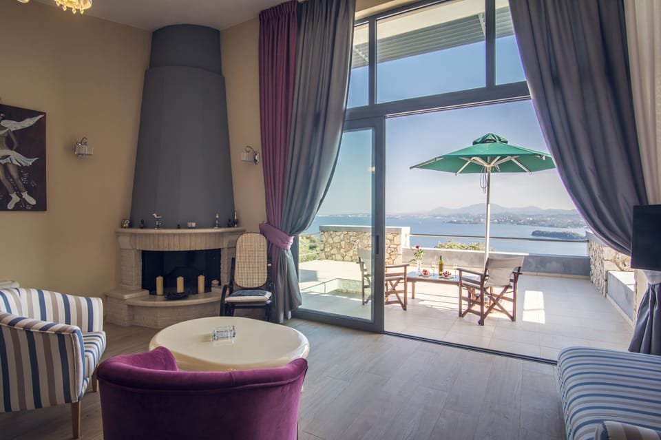 Villa | Living area | 36-inch flat-screen TV with satellite channels, TV, fireplace