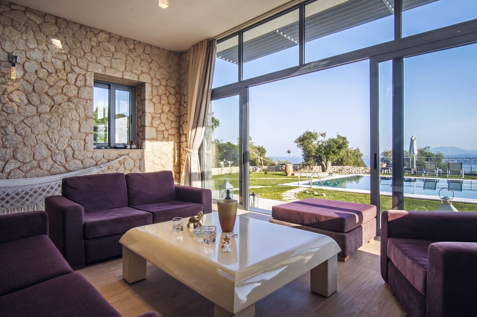 Villa | Living room | 36-inch flat-screen TV with satellite channels, TV, fireplace
