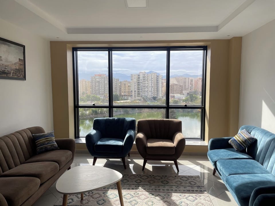 Family Room | Living area | 130-cm flat-screen TV with satellite channels