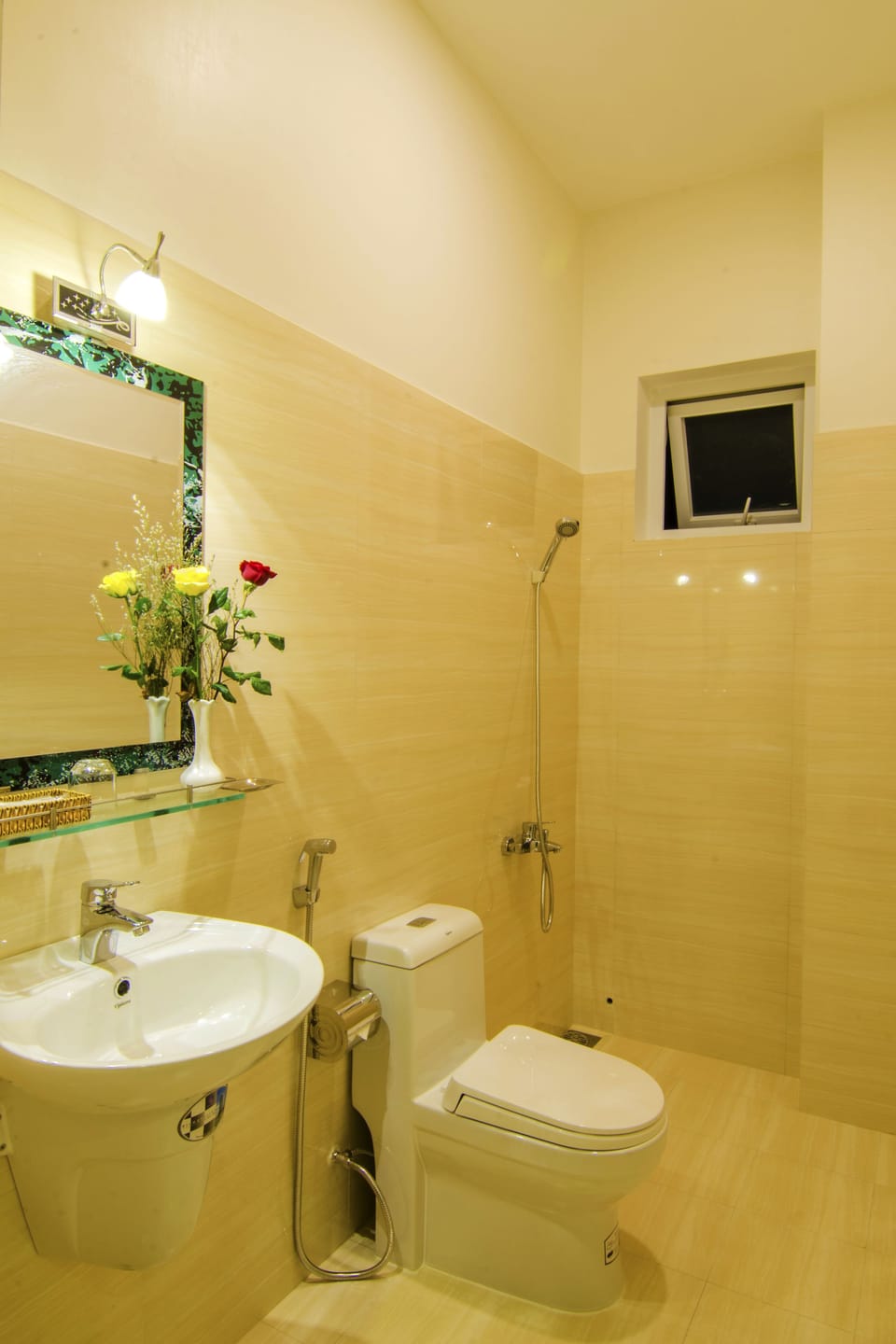 Shower, free toiletries, hair dryer, slippers