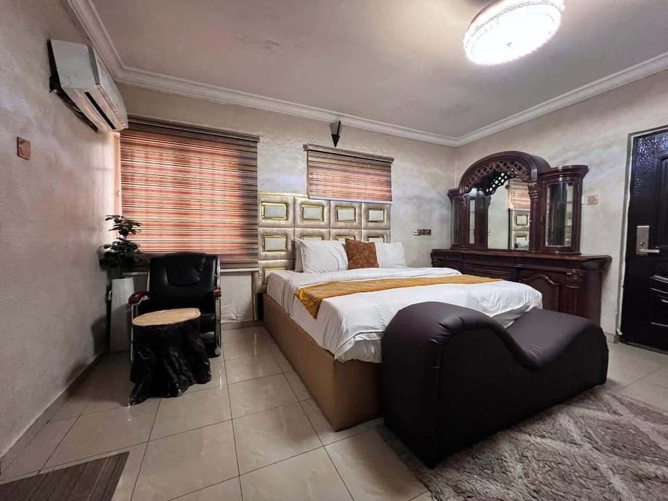 Deluxe Room, Balcony, City View | In-room safe, desk, laptop workspace, blackout drapes