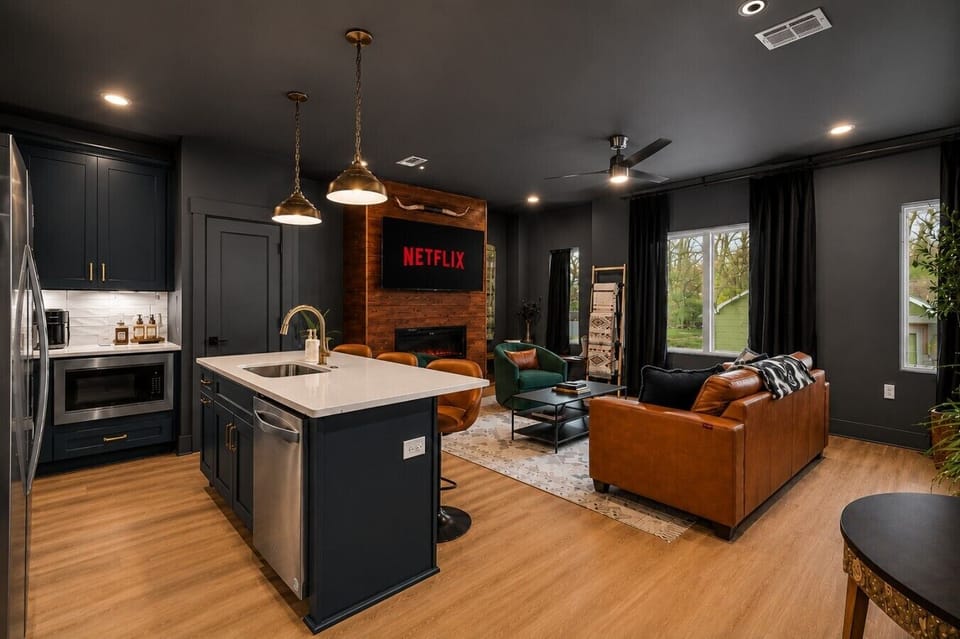 Artfully designed entertainment hub perfect for movie nights and cooking together.