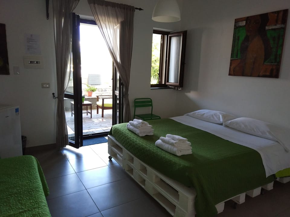 Camera Comfort Vista Mare | Garden view