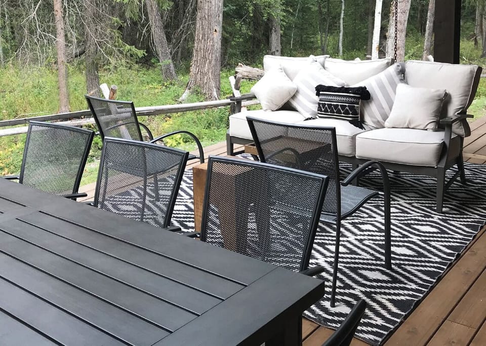 Gather outdoors for relaxed meals surrounded by peaceful woods.