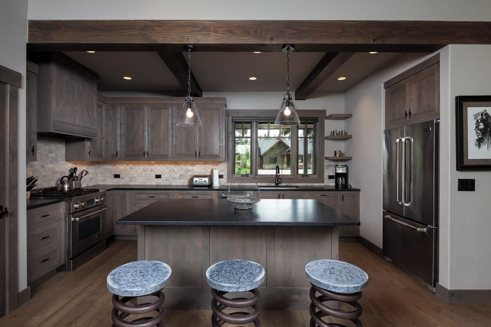 Cook gourmet meals in a sleek kitchen with oversized island.