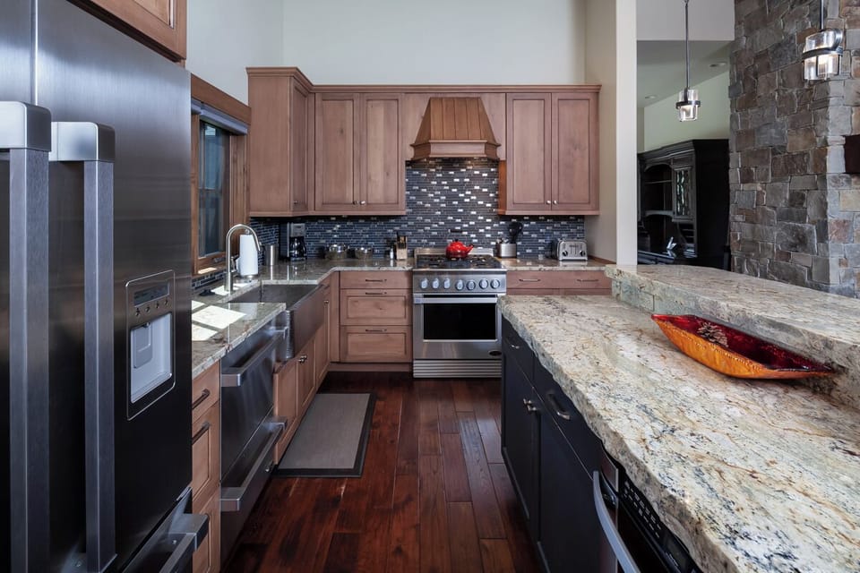 Cook with ease on premium appliances and generous prep space.