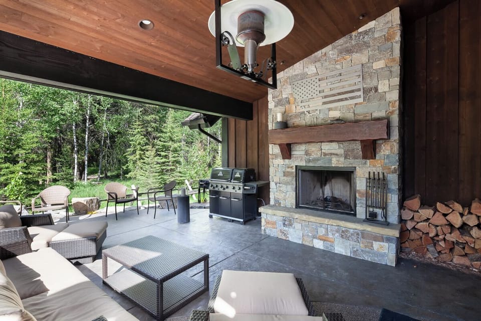 Lounge fireside on the covered patio and grill dinner slowly.