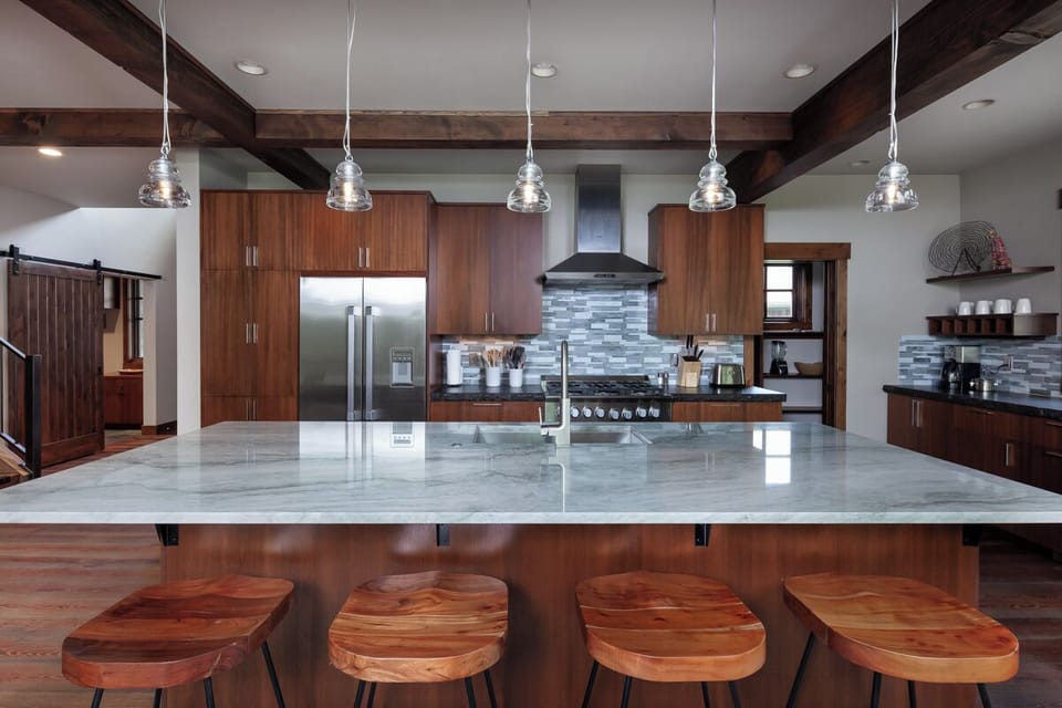 Gather around the marble island for cooking and conversation.