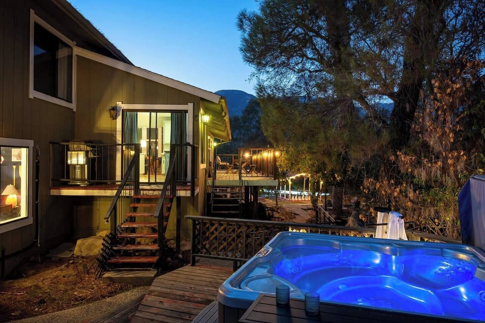 Private Deck & Hot Tub – Unwind in your own bubbling spa under the trees.