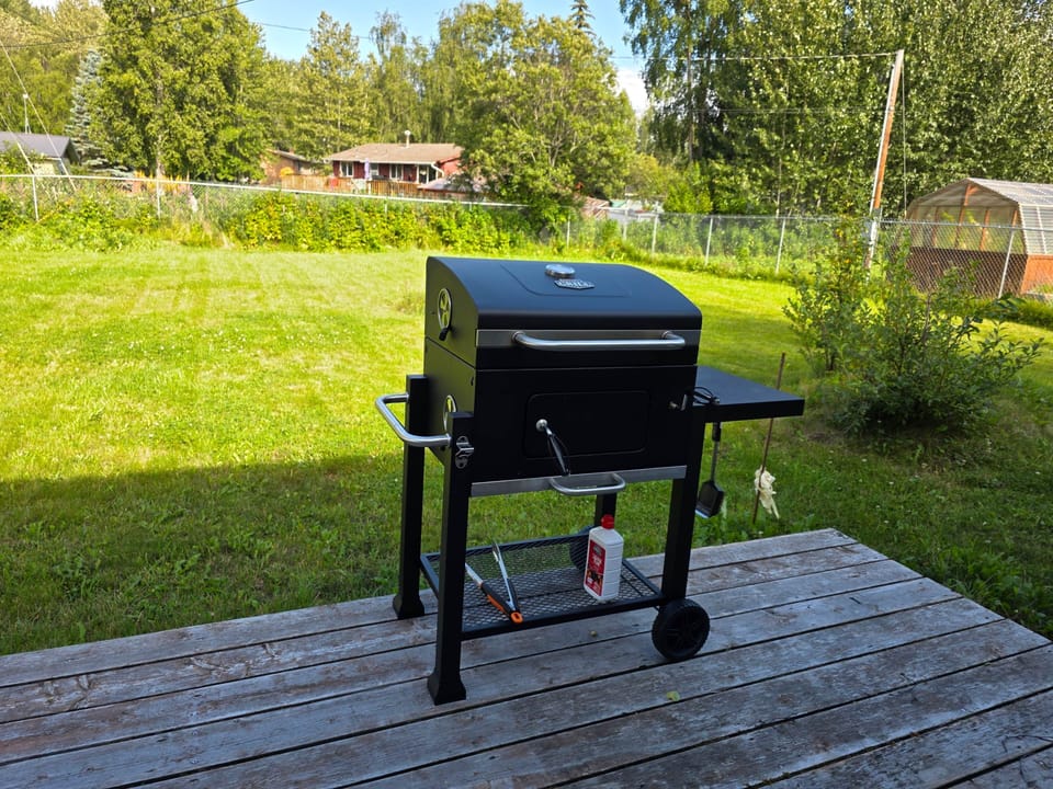 Charcoal grill on the back porch