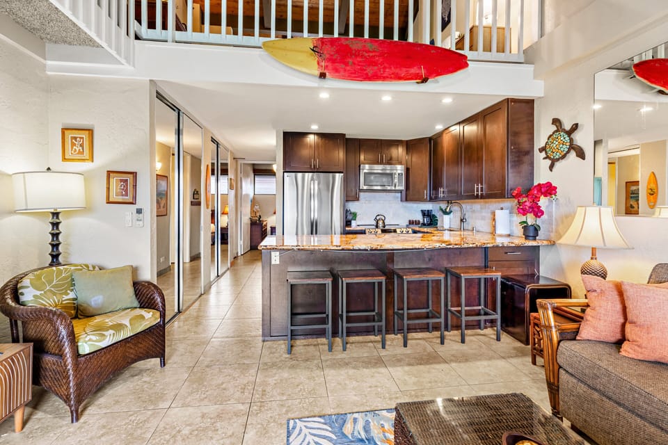Open-concept living and dining areas create a comfortable space to gather after a day in Maui.
