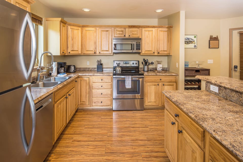 Modern appliances with wooden accents | Main Level