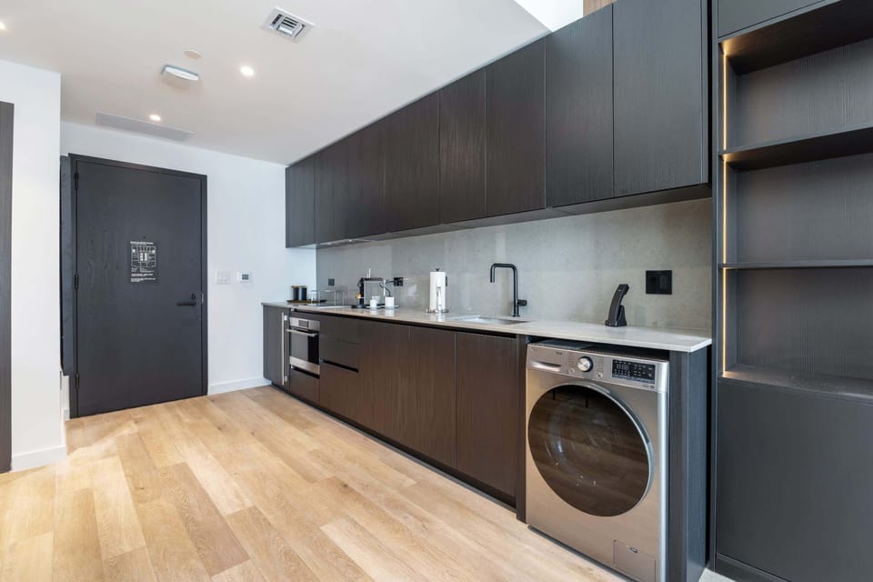 The sleek, open kitchen is well equipped for an unforgettable getaway​