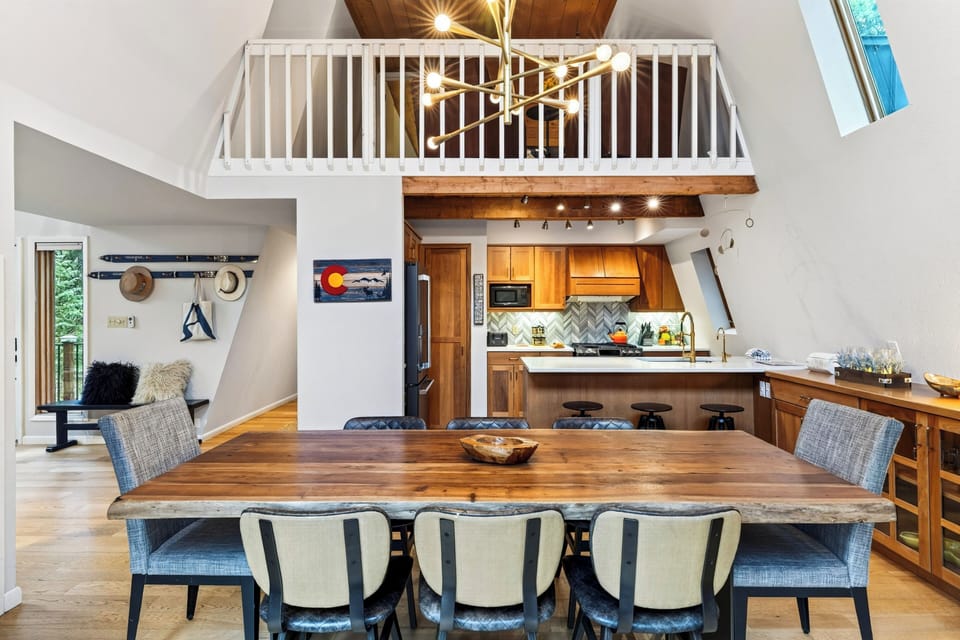 Dining table beneath the loft