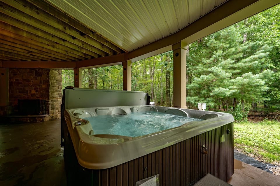 Covered hot tub on the lower patio.