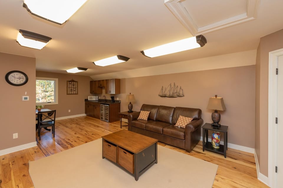 Leather seating in the pool house loft — claim it for a late-night hangout.