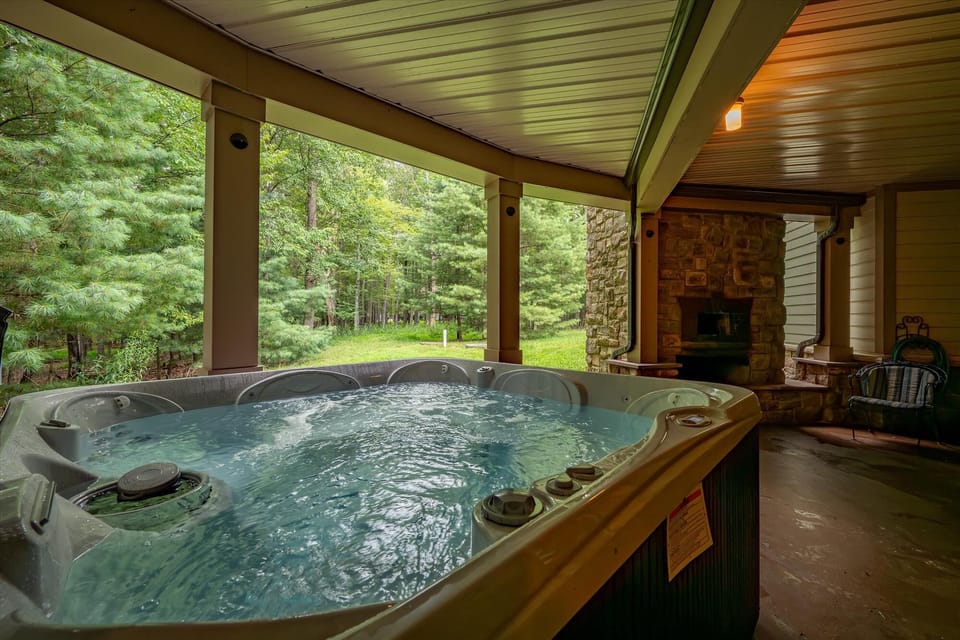 Hot tub with woodland views.