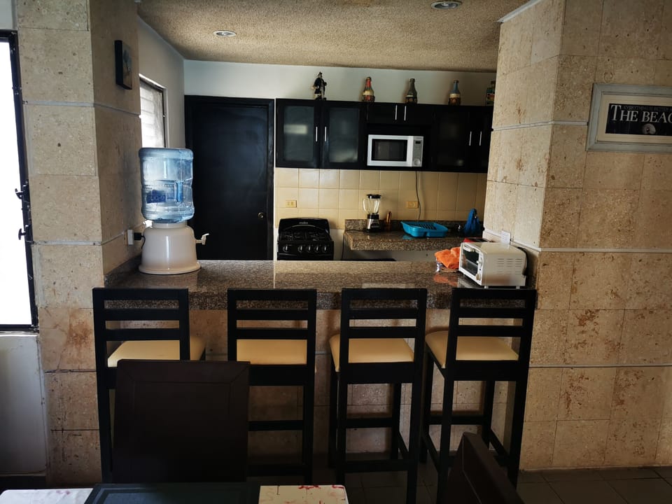 Family Apartment, 3 Bedrooms, Ocean View | Living area | 32-inch flat-screen TV with cable channels, TV
