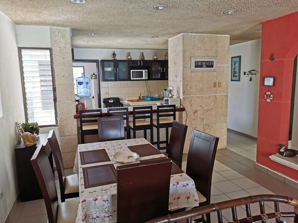 Family Apartment, 3 Bedrooms, Ocean View | Living area | 32-inch flat-screen TV with cable channels, TV