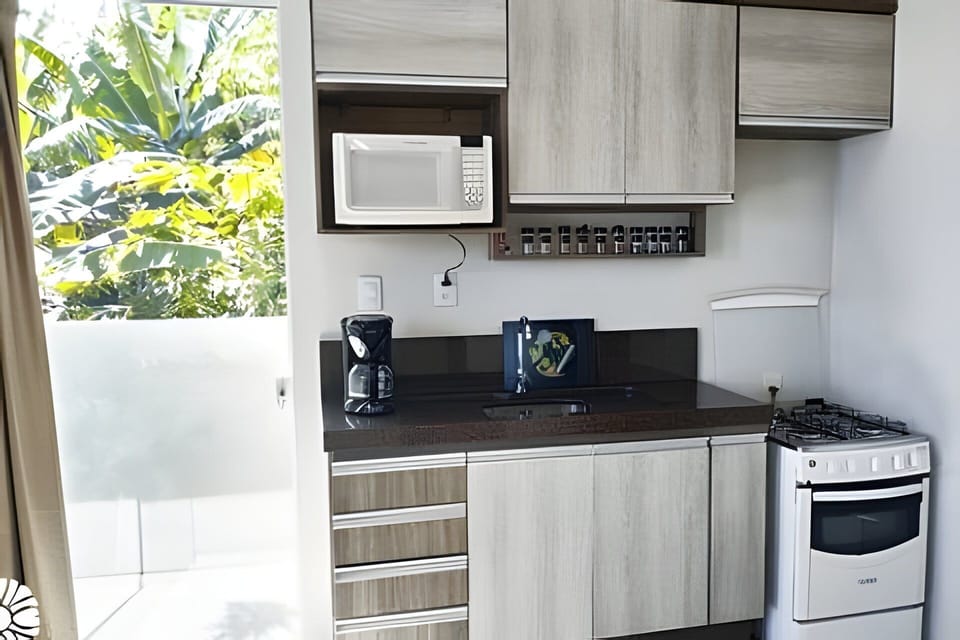 Basic Chalet | Private kitchen | Espresso maker, coffee/tea maker, full-size fridge, microwave
