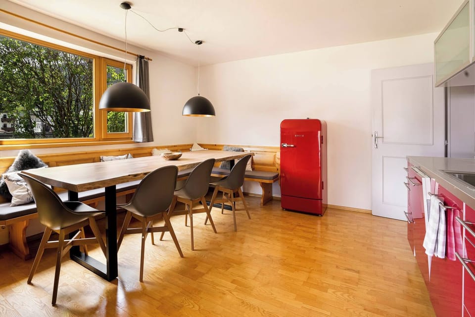 Large dining kitchen in KitzAlps Standard Apartment, ideal for families and groups booking lodging in Kirchberg.