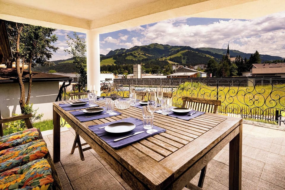 Sunny terrace at KitzAlps Standard Apartment, ideal for relaxing after skiing, hiking or biking in the Brixental.