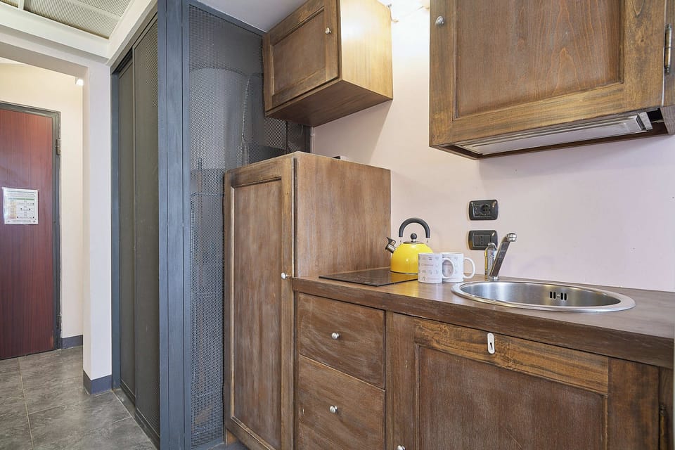 Apartment (1 Bedroom) | Private kitchen | Microwave, stovetop, electric kettle, cookware/dishes/utensils