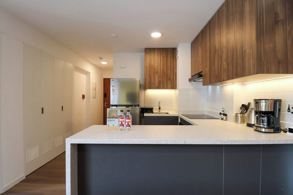 Spacious kitchen with ample counter space and modern finishes.
