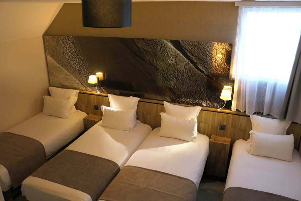 Quadruple Room | Premium bedding, desk, blackout drapes, soundproofing