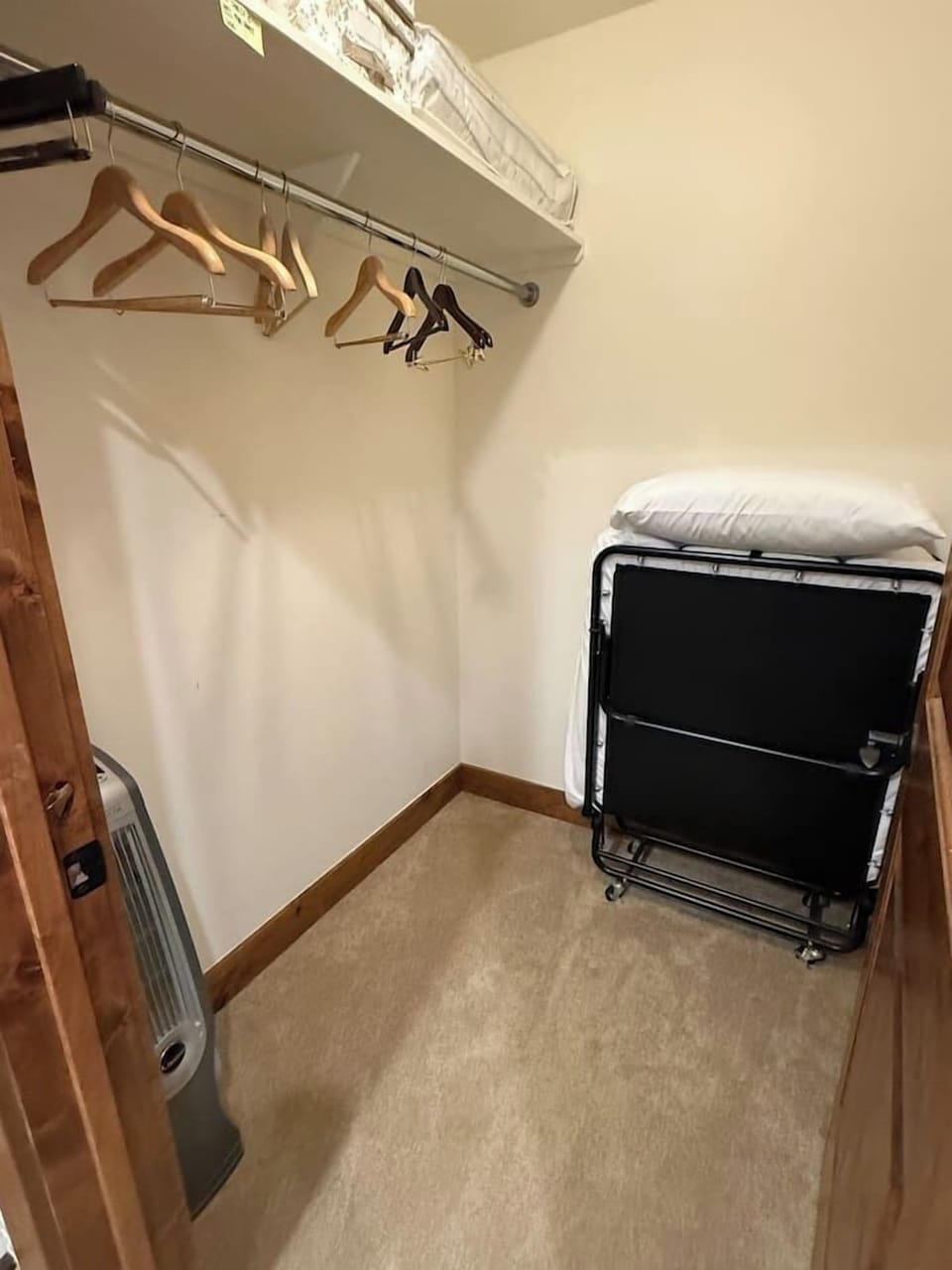 Roll away bed is stored in the attached walk in closet but will be set up in the bedroom for reservations with 10 guests. 