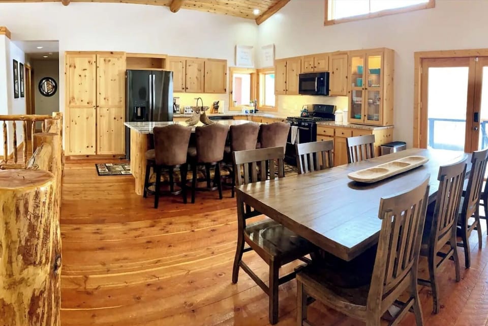 Fully equipped kitchen with everything you need. Hallway to bedrooms 2 and 3. Easy access from the garage to the main floor. Large patio and hot tub access right outside these doors.