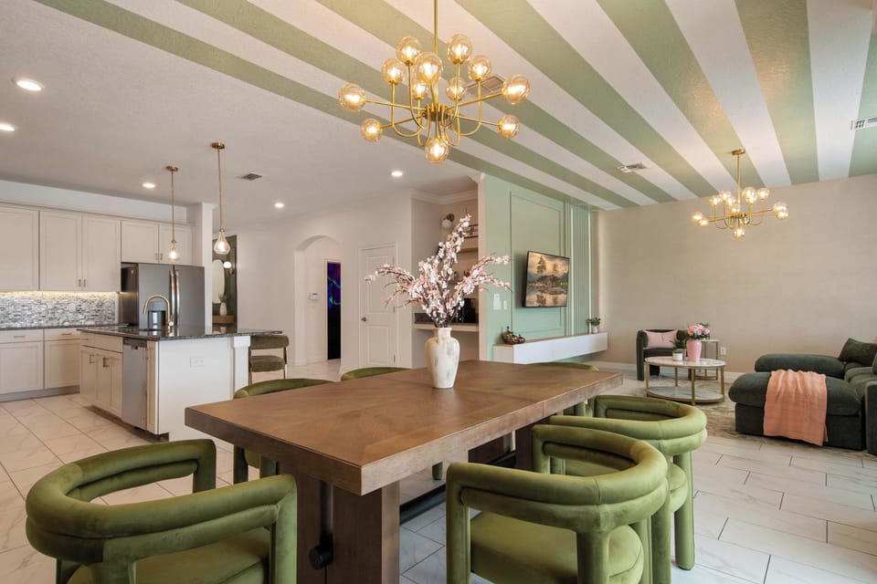 Gather around the dining table for family breakfasts, shared dinners, and conversations that continue long after the plates are cleared. The open kitchen keeps everyone connected, whether someone is preparing a favorite meal or friends are chatting.