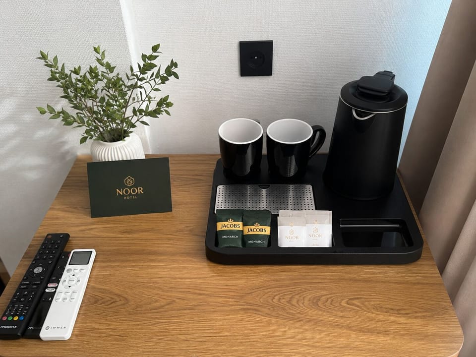Desk, laptop workspace, iron/ironing board (on request), WiFi (free)