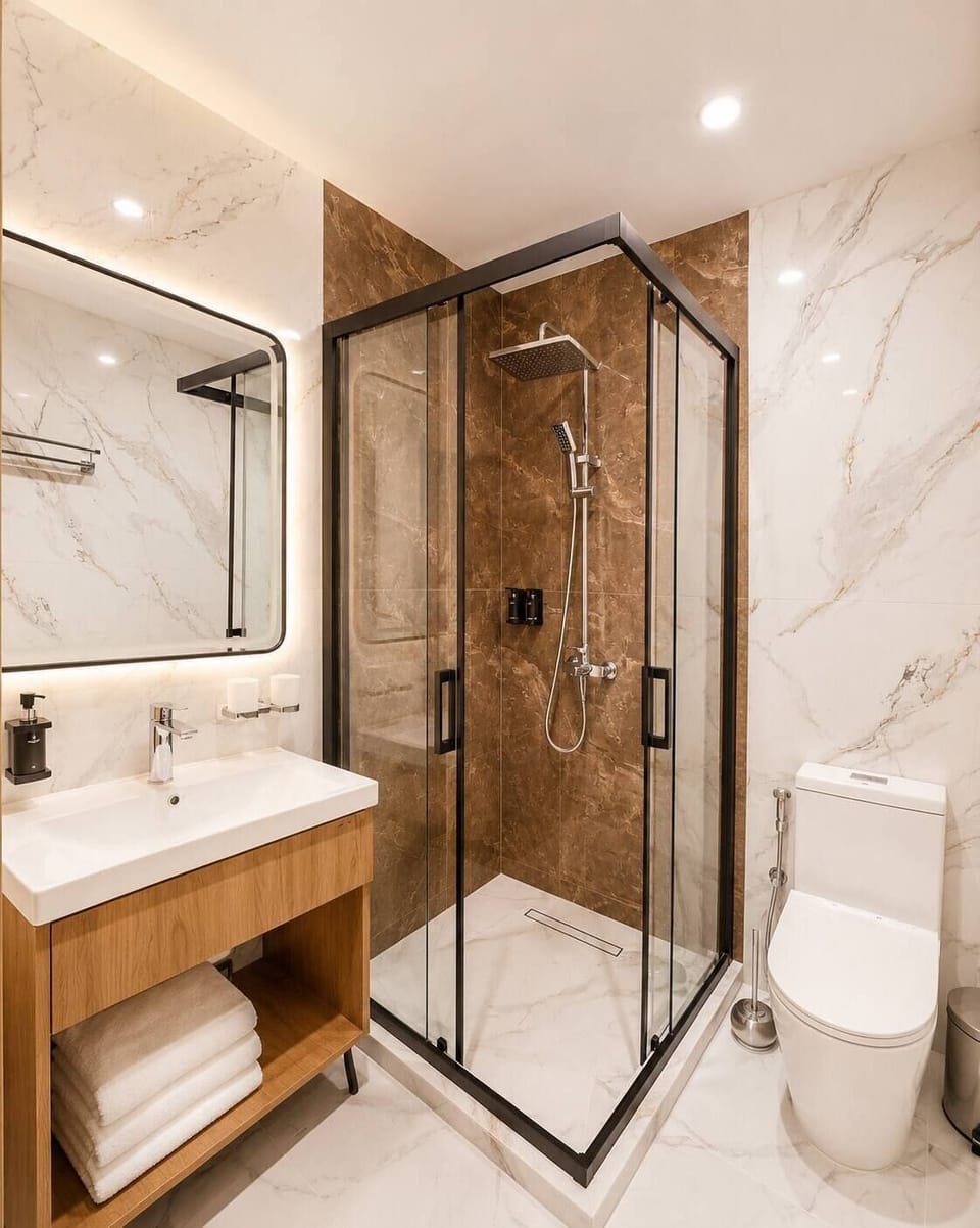 Shower, hair dryer, slippers, towels