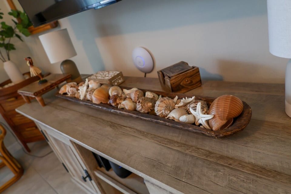 Beautiful seashell accents add a coastal touch.