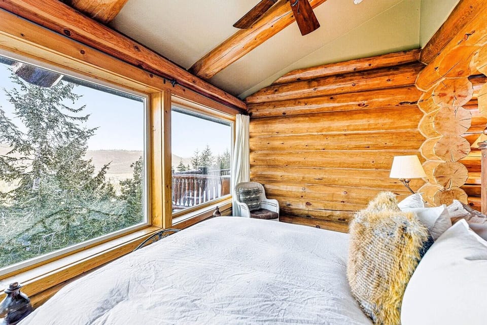 Master Bed as you wake up to the beautiful mountain top view.