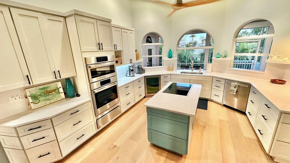 Custom kitchen; wine captain; quartz counters.