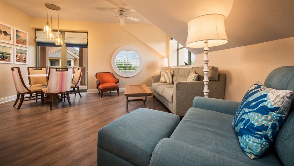 Living Area • Sofa, Dining & Open Concept