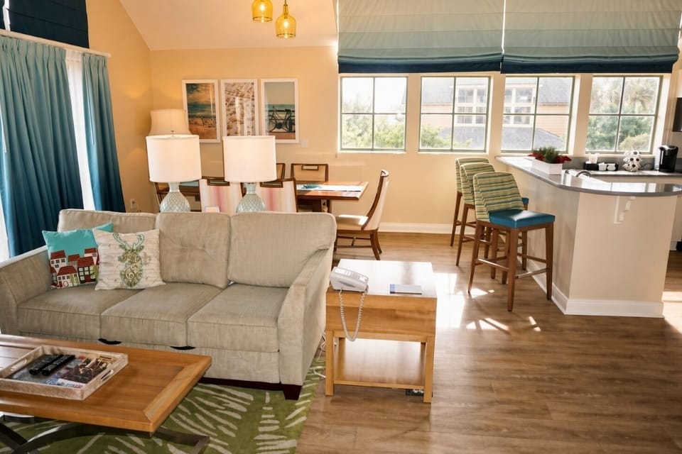 Living Area • Sofa, Dining Table & Kitchen Bar