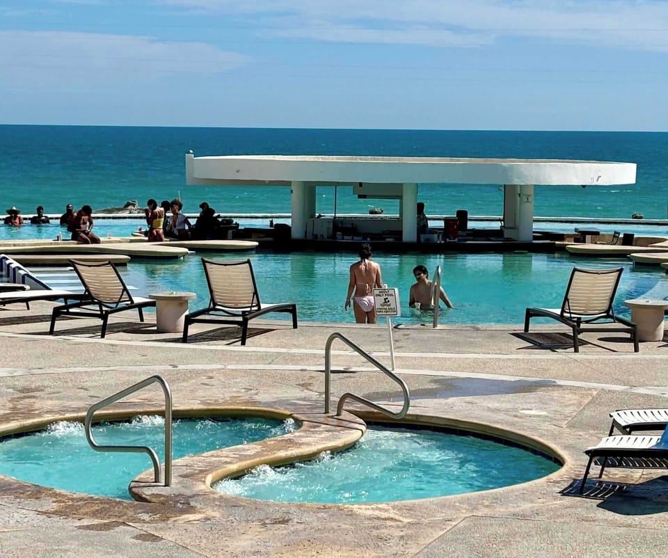 🌊 Your perfect beach getaway is waiting! ☀️ Relax by the pool, enjoy the ocean breeze, and make memories in paradise. 🏖️🌴💦