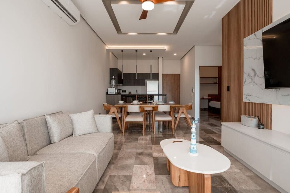 Spacious open-concept living areaRelax in a bright and elegant space that combines comfort, style, and functionality.