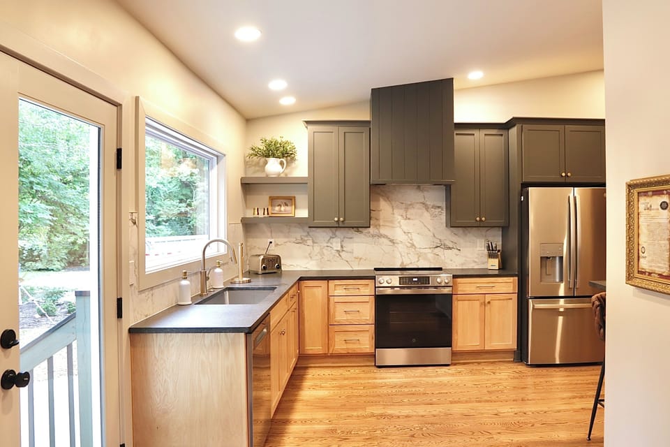 Bright modern kitchen with forest views and stylish finishes