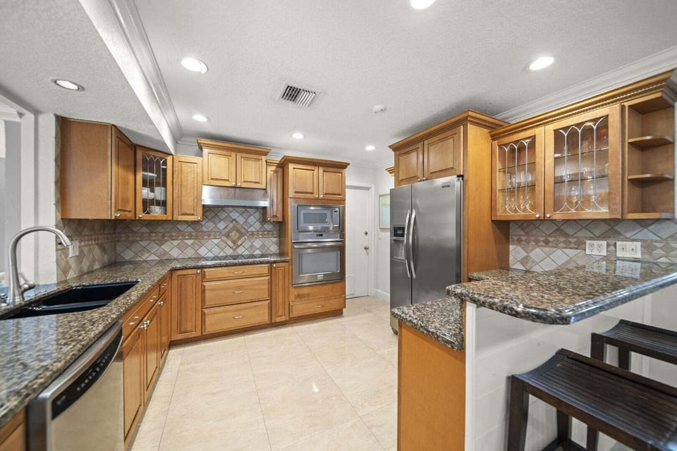 Fully stocked kitchen with
utensils and cookware